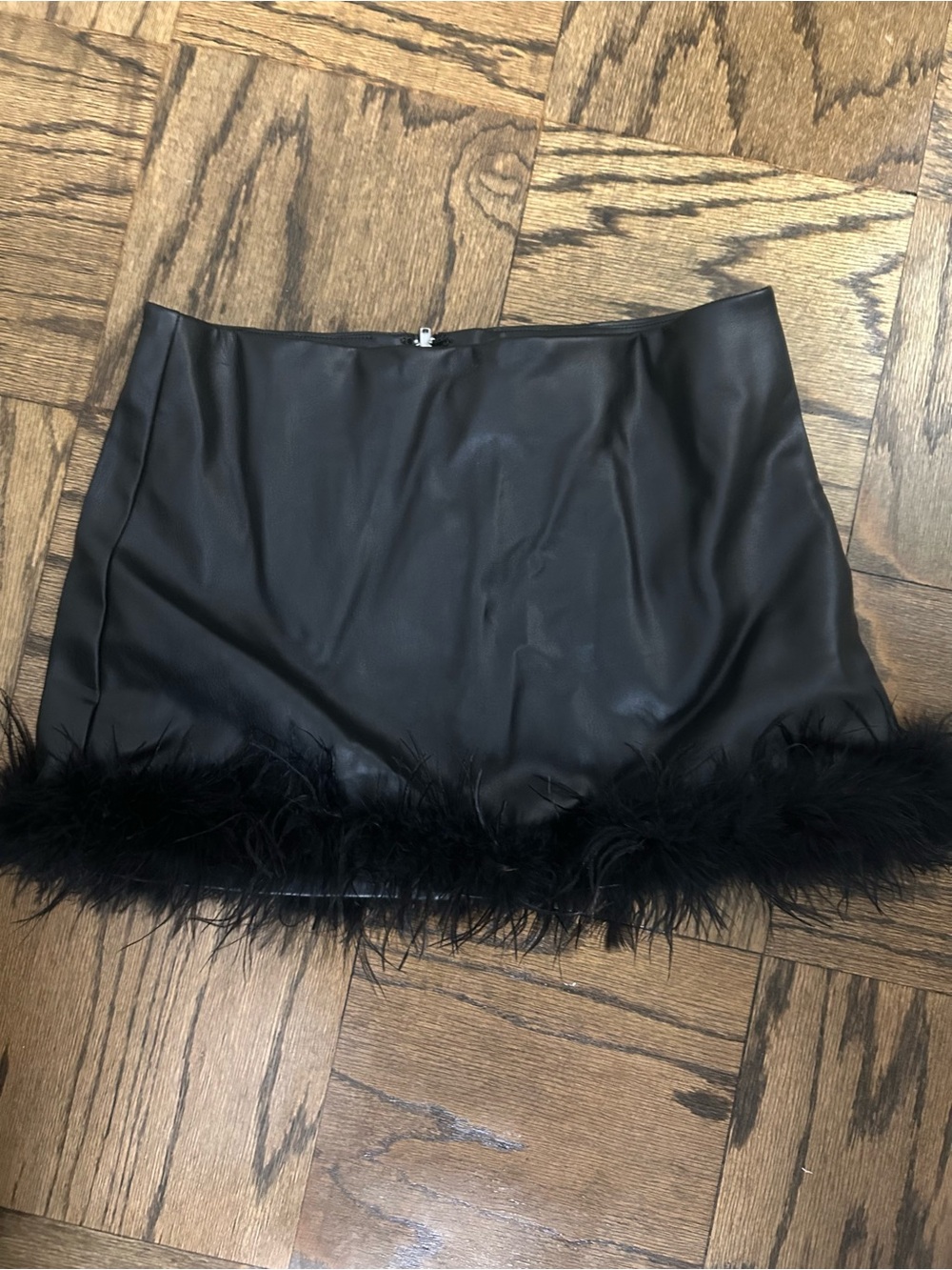 Black Faux Leather Mini Skirt with Feather Hem